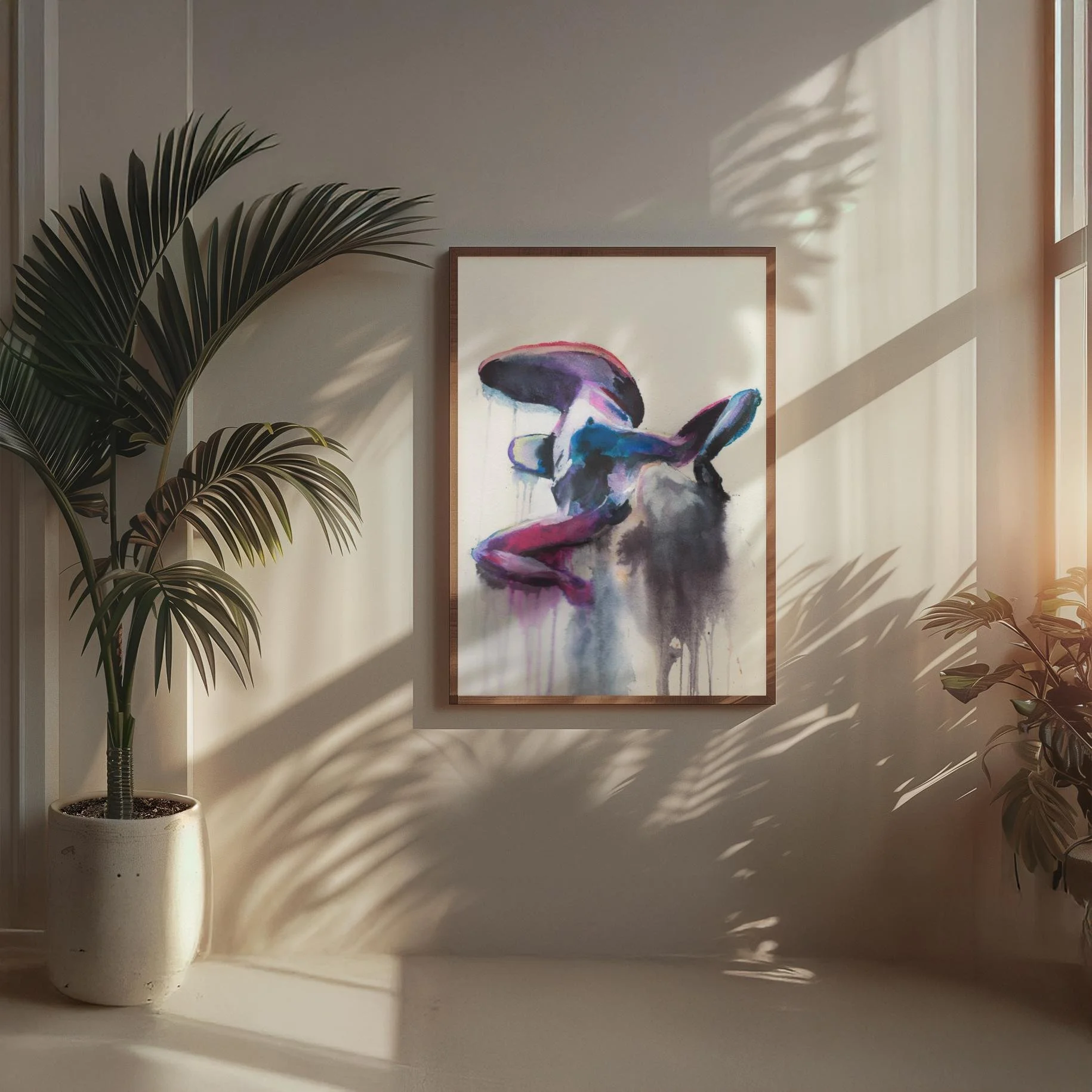 Framed “Laying Splash” painting with purple and indigo hues hangs on a softly sunlit wall, enhancing the warmth and artistic depth of the space.