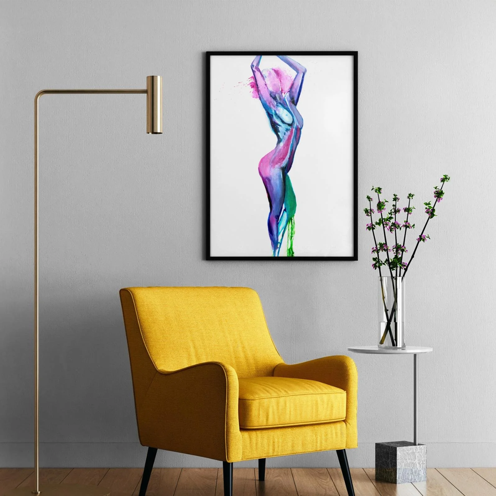 “Lotus” featured in a cozy reading nook with a yellow armchair, gold lamp, and floral arrangement, offering a vibrant pop of color against a gray wall.