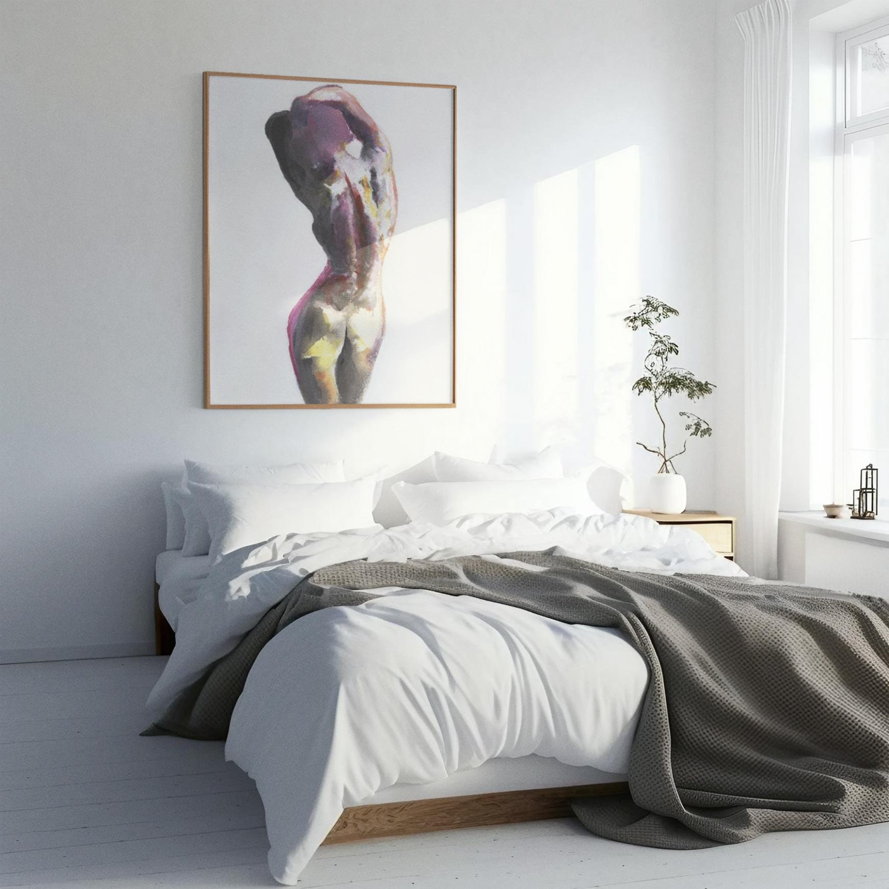 3. Framed “Back Beauty” painting in a serene white bedroom. The vibrant nude contrasts against soft light and clean, minimal decor.
