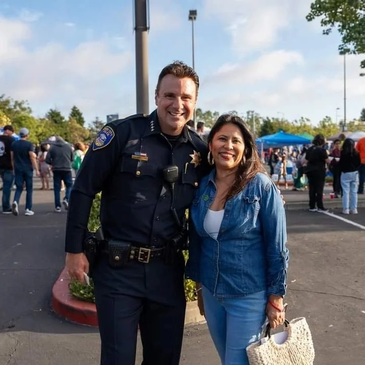 liz with police officer.jpeg