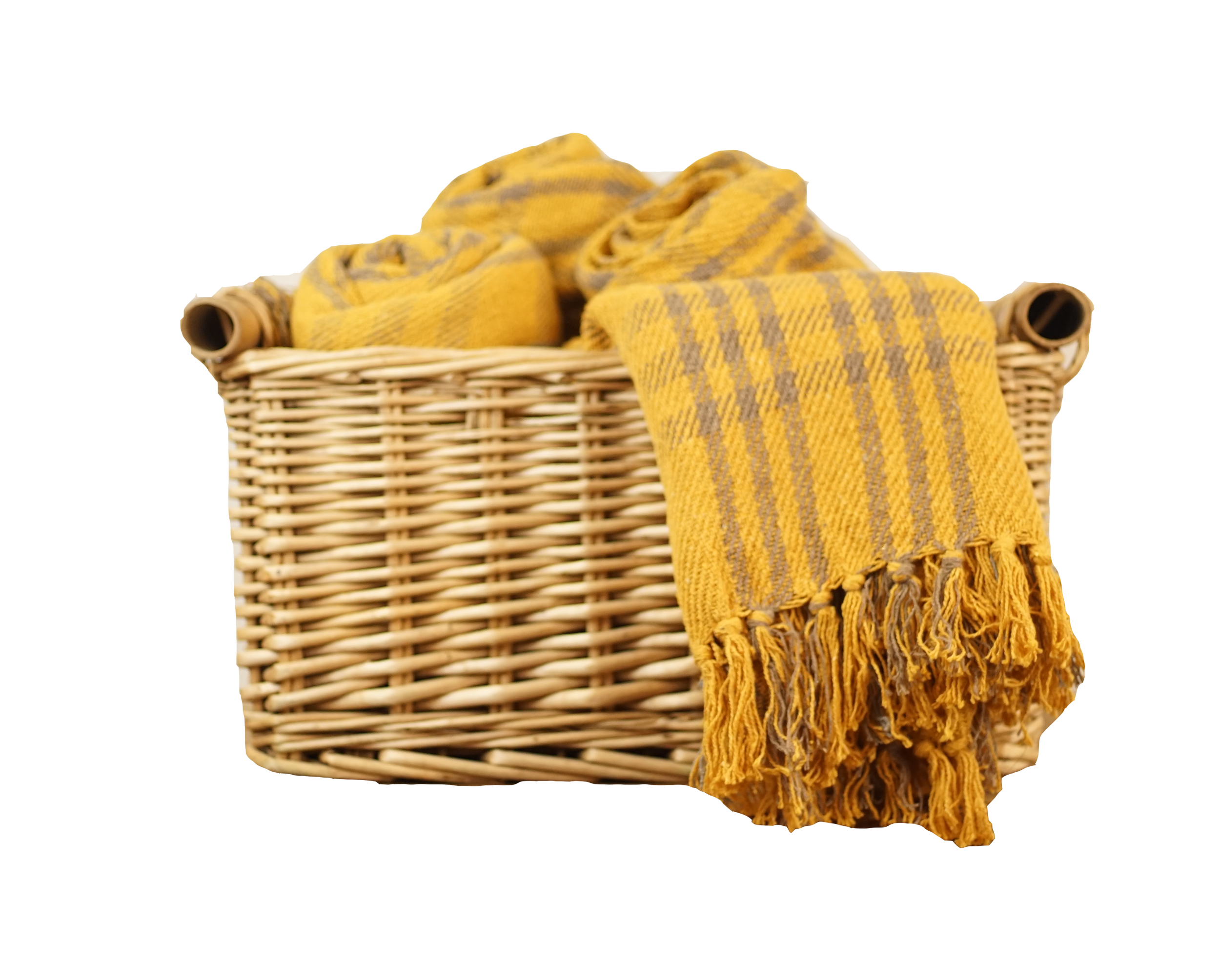 A wicker basket filled with yellow towels that have gray stripes and fringed ends.