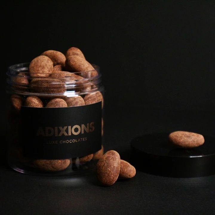 Almond Drag&eacute;e (Dra-zjee) - where Australian almonds are slow roasted and then slowly enveloped by layers and layers of perfectly tempered 64% premium dark chocolate. The aroma of earthy roasted almonds coupled with the rich cocoa aromas of the
