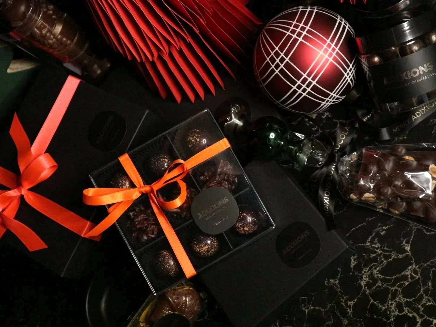 A little sparkle, a lot of chocolate &mdash; and a very Merry Adixions Christmas in the making. ✨🍫💚

Chocolates are being handcrafted, perfect gifts are being wrapped, the ribbons tied, and the chocolate magic is almost ready to share. 🎄🎁💫💚

#M