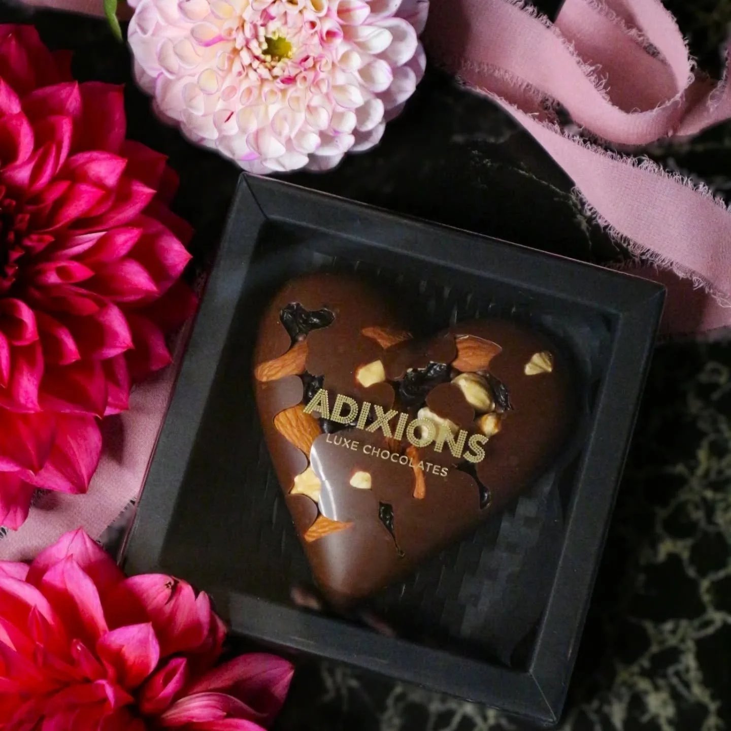 Ooh la la..the adixions Lover's Heart has been reimagined just in time for Mother&rsquo;s Day &mdash; the Love-in-a-Heart Chocolate, handcrafted in small-batches, is silky, rich, and adorned with the perfect crunch of roasted hazelnuts and almonds an