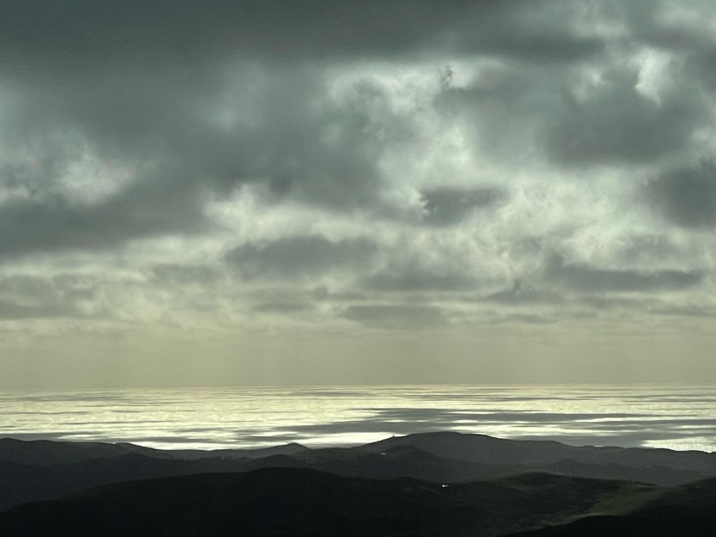 A mosaic of light on the Pacific coast from Skyline Boulevard during a snow storm in February