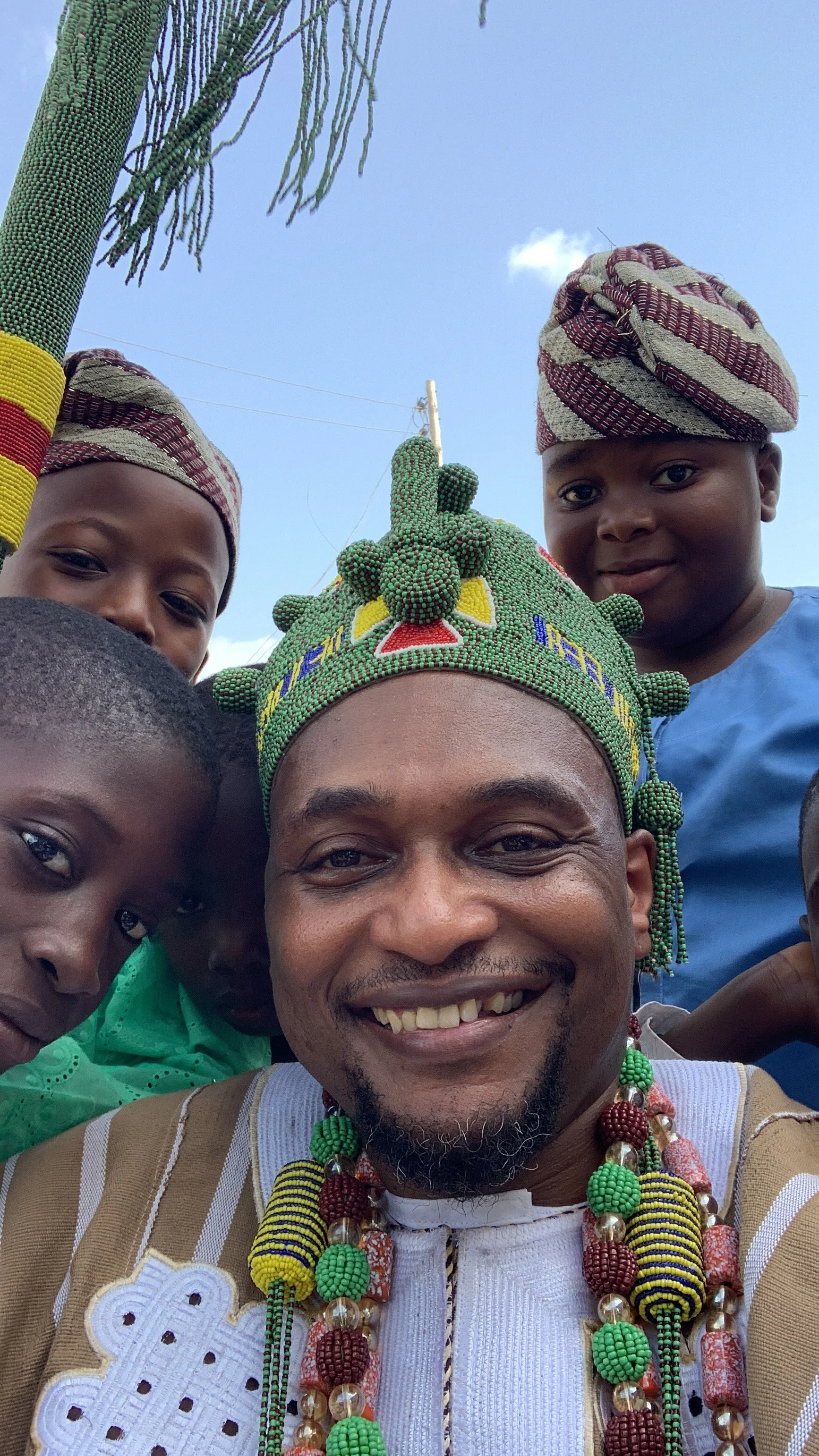 Following traditional ceremonies in Ìlóbù, this moment captures the warmth and fellowship shared with members of the local community. Beyond ceremonies and formal recognitions, the lifelong study of Ifá has been built through relationships, cultural 