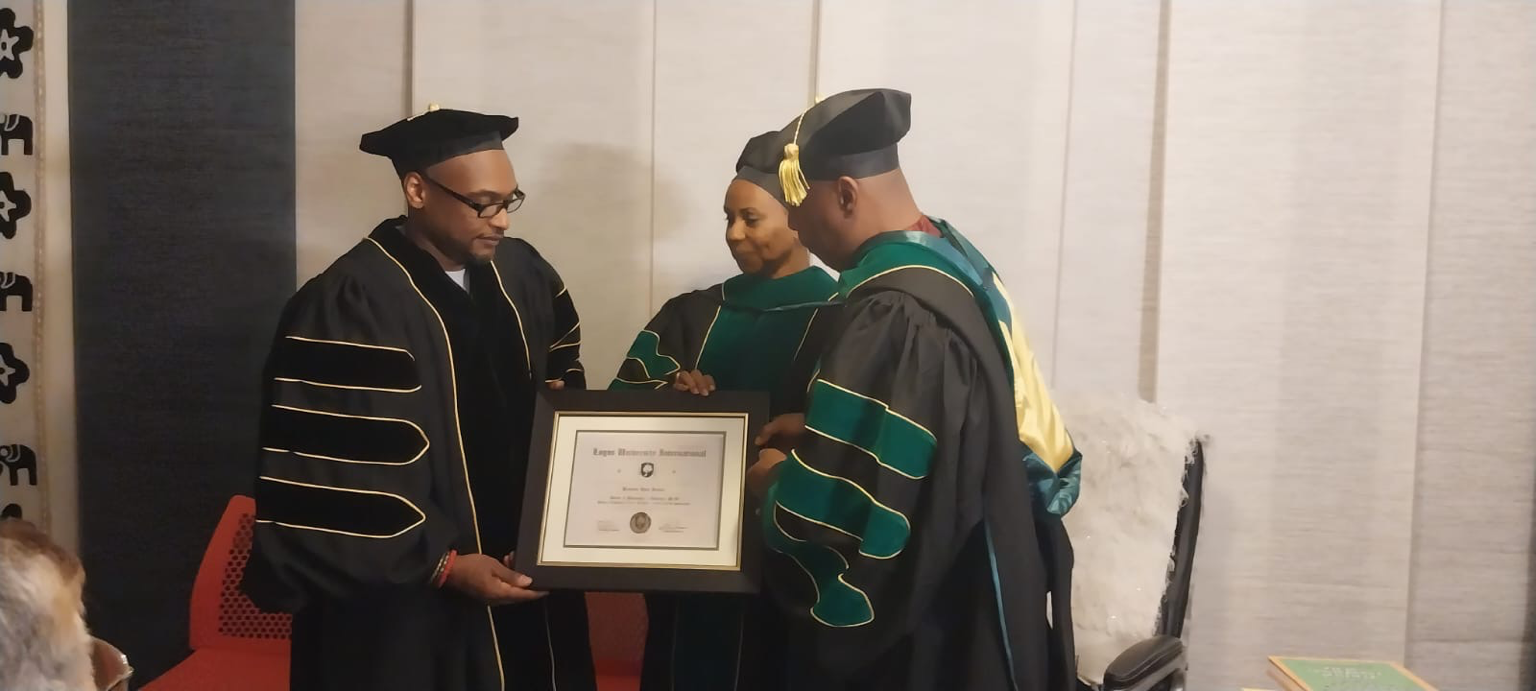 Receiving formal recognition for scholarly achievement during the conferral of the Doctor of Philosophy (Ph.D.) in Theology, honoring ongoing contributions to the preservation, teaching, and advancement of Ifá, Òrìṣà tradition, and African sacred kno