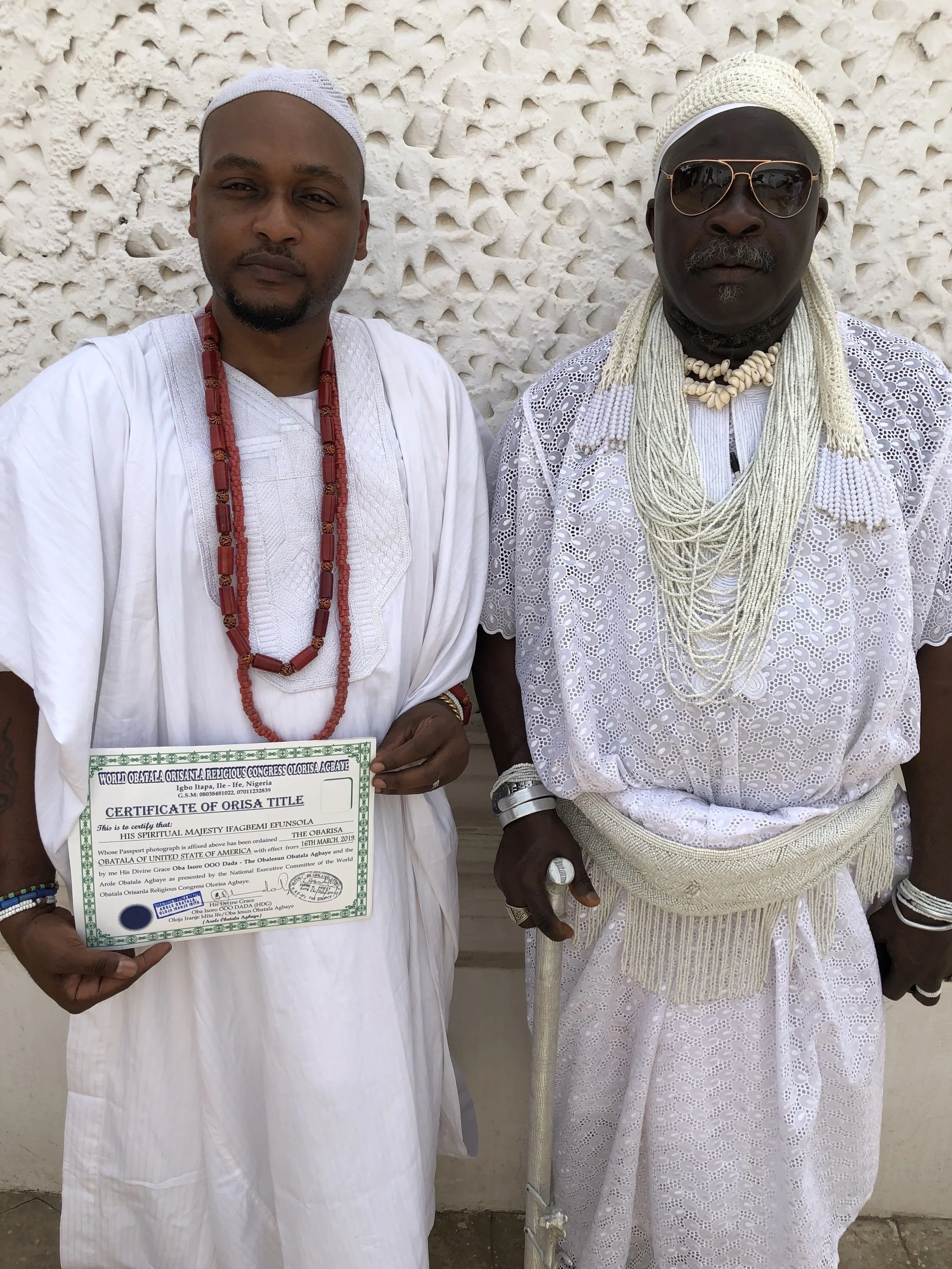 With Obalesun O.O.O. Dada, Arole Obàtálá Àgbáyé (World Head of Obàtálá), at the Obàtálá Holy Temple in Ilé-Ifẹ̀, Nigeria, following my conferment as ObaRisa Obàtálá of America.