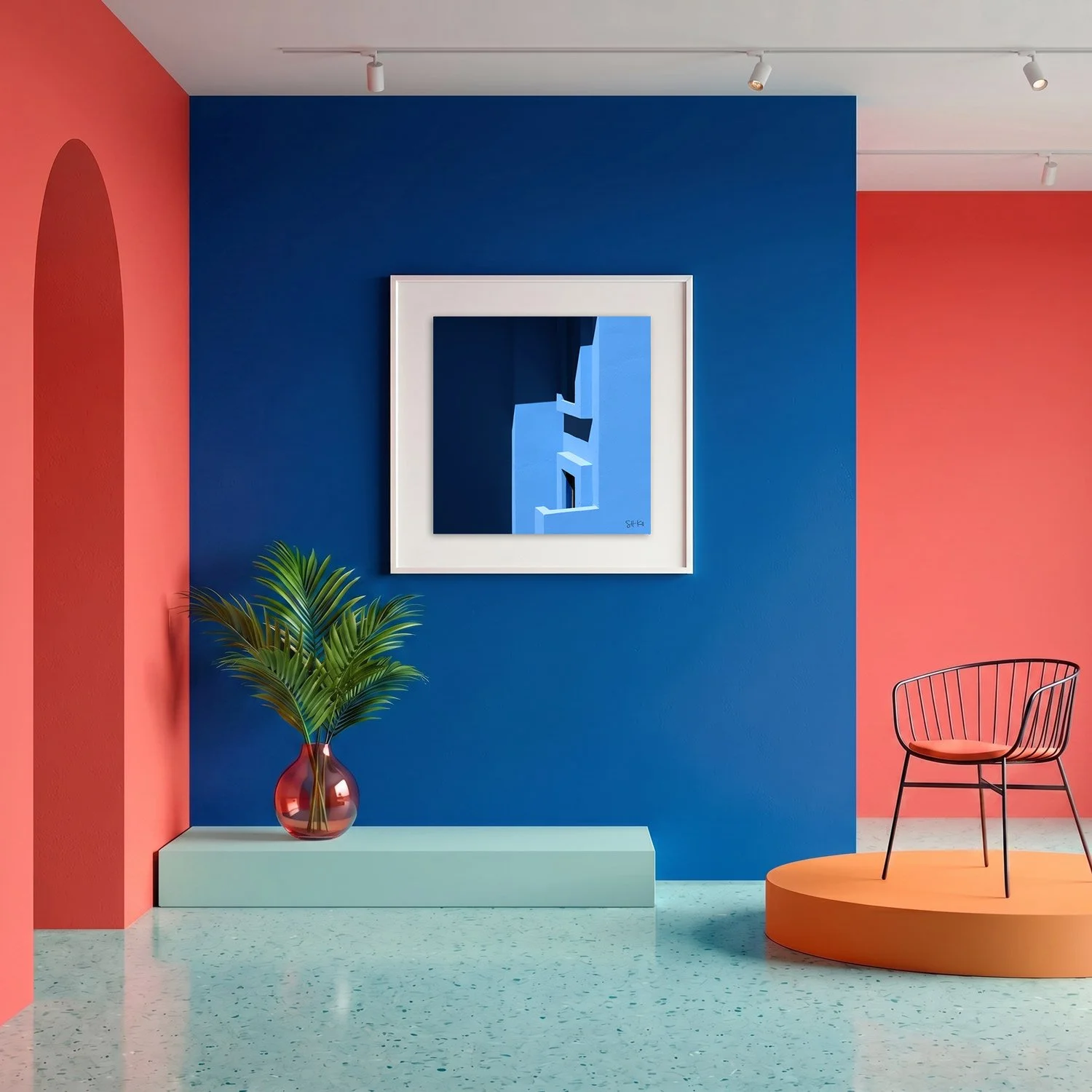 Muralla Roja 23 framed photography print in bold cobalt blue and coral gallery interior