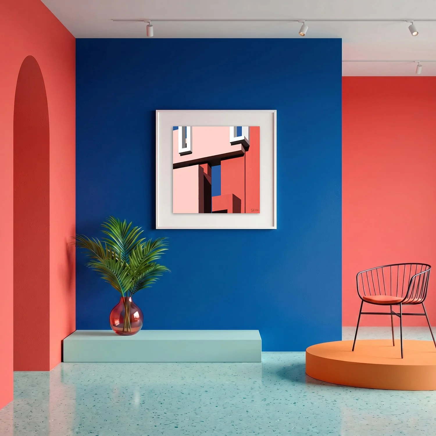 Muralla Roja 01 framed photography print in bold cobalt blue and coral gallery interior