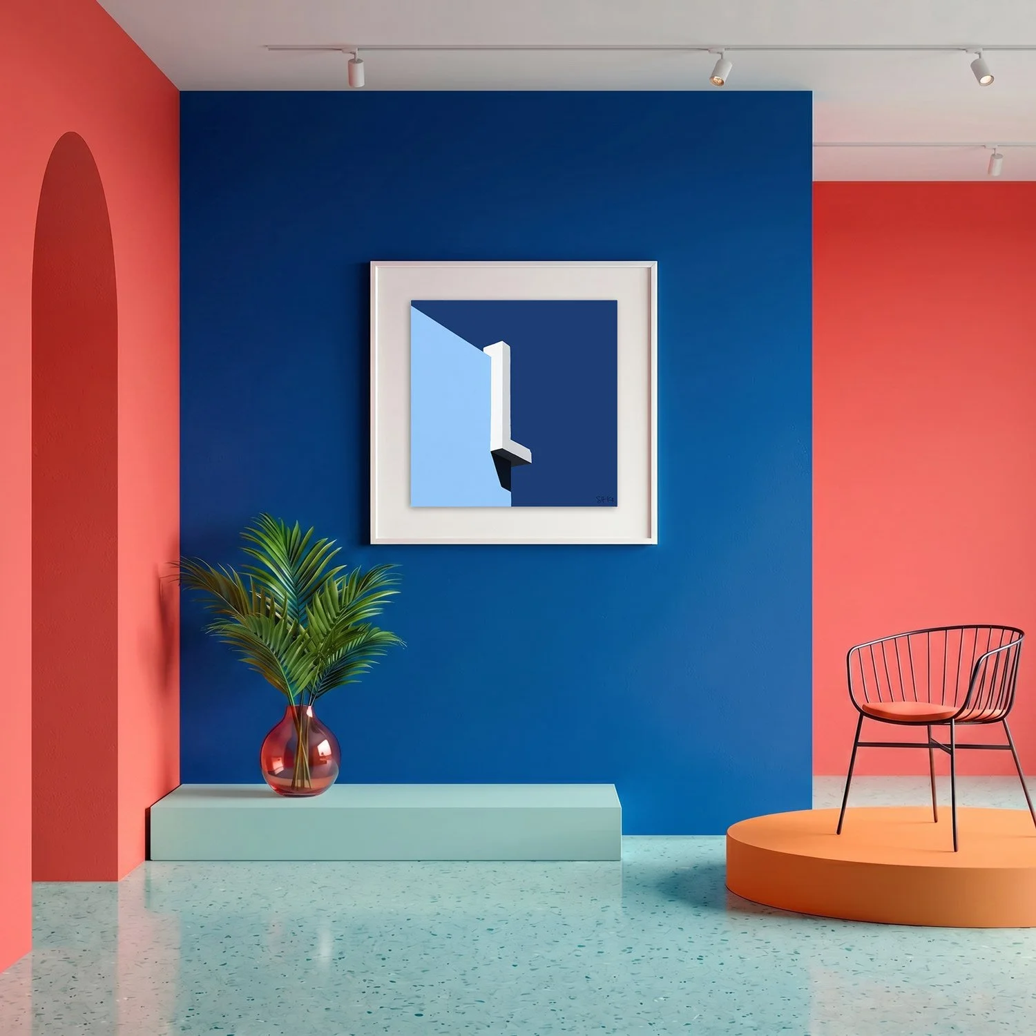 Muralla Roja 02 framed photography print in bold cobalt blue and coral gallery interior