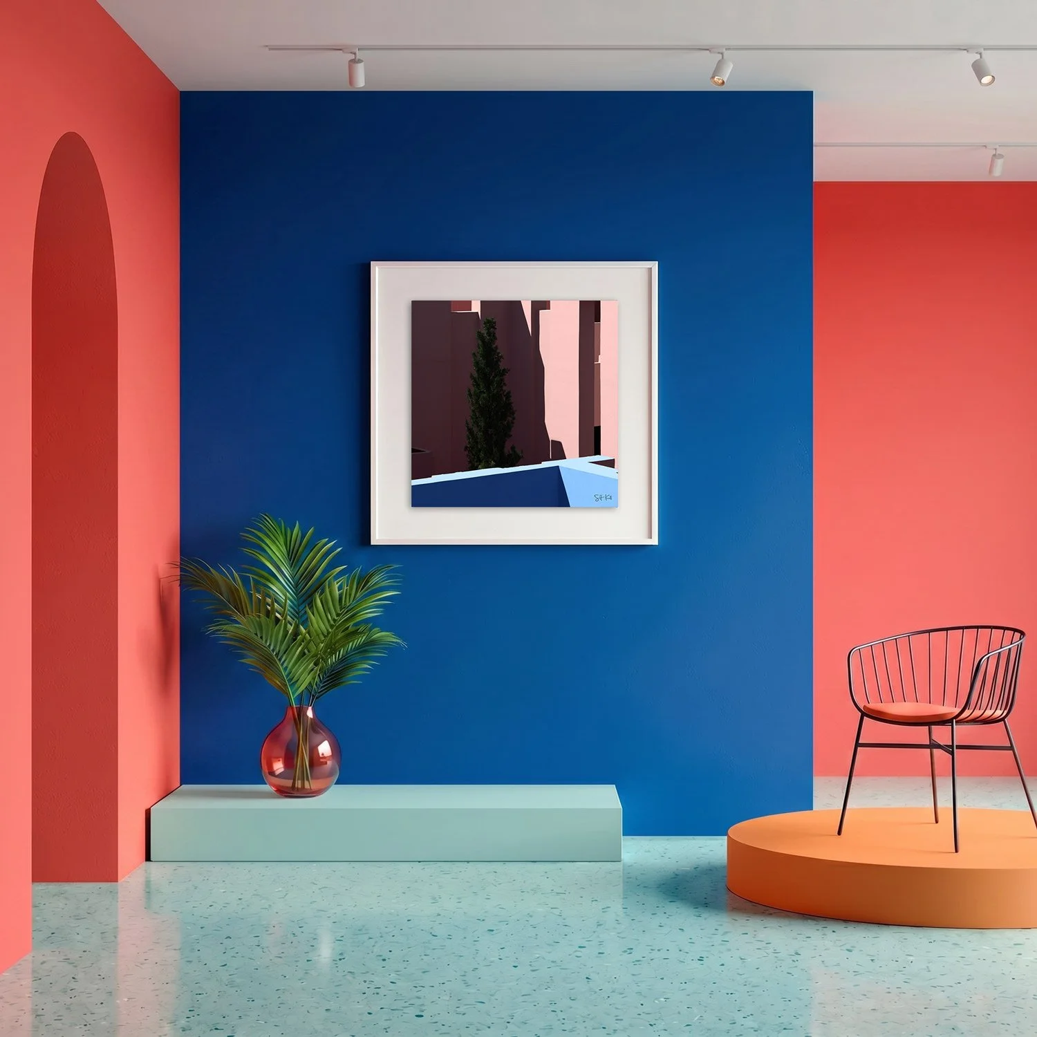 Muralla Roja 16 framed photography print in bold cobalt blue and coral gallery interior