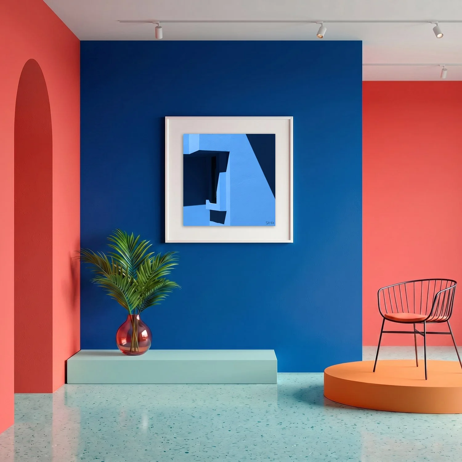 Muralla Roja 11 framed photography print in bold cobalt blue and coral gallery interior