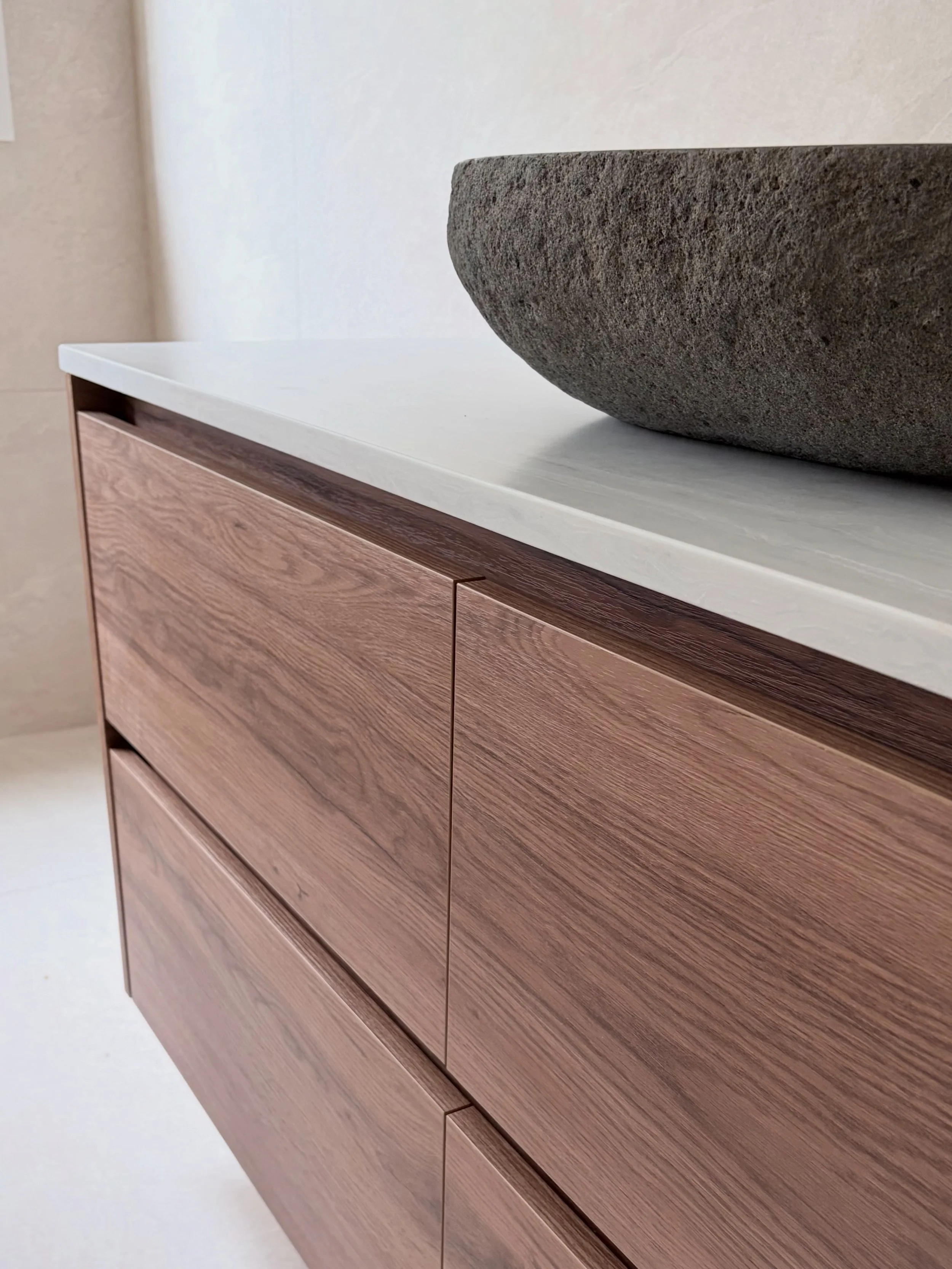 Look closer. 👀

This is where the design details start to come together.

The custom bathroom vanity, warm timber tones, stone benchtop and that beautiful basin were all chosen to bring texture, warmth and an organic feel to the Somerville bathroom.