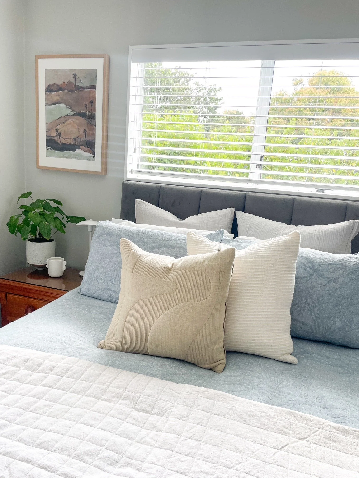 Auckland bedroom refresh with modern bedroom styling and contemporary cushions