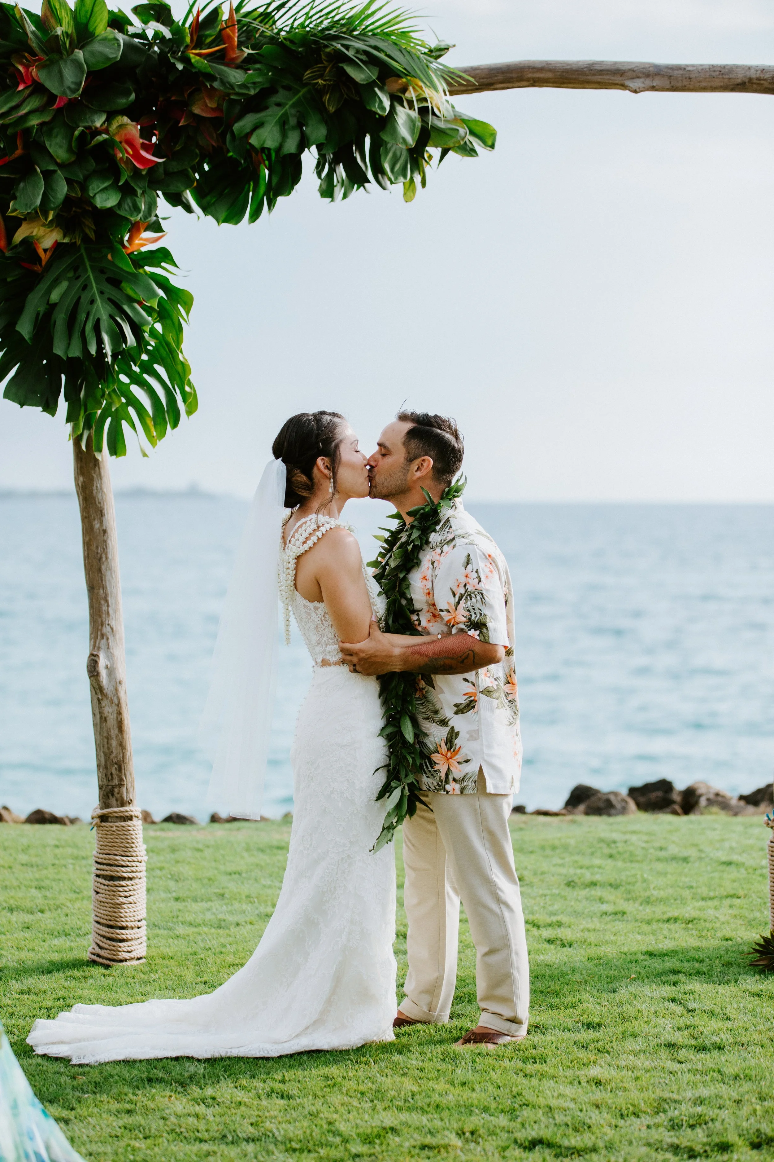 Couple seal their union with a kiss at their ceremony at Westin Hapuna
