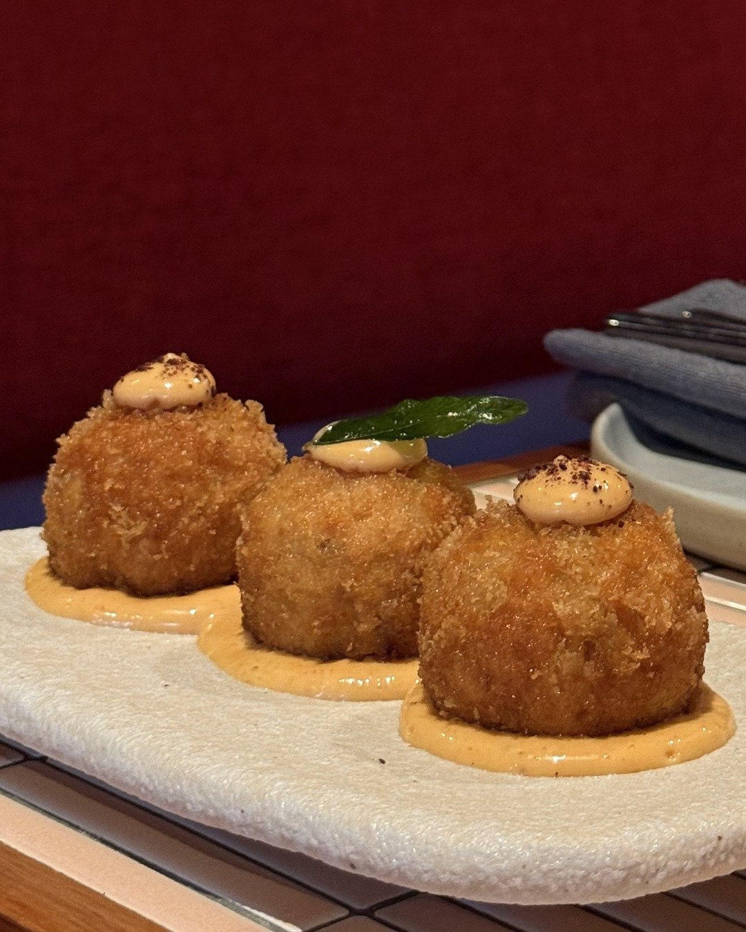Confit duck and sweet potato croquettes.

#codecairns #cairnsrestaurant
