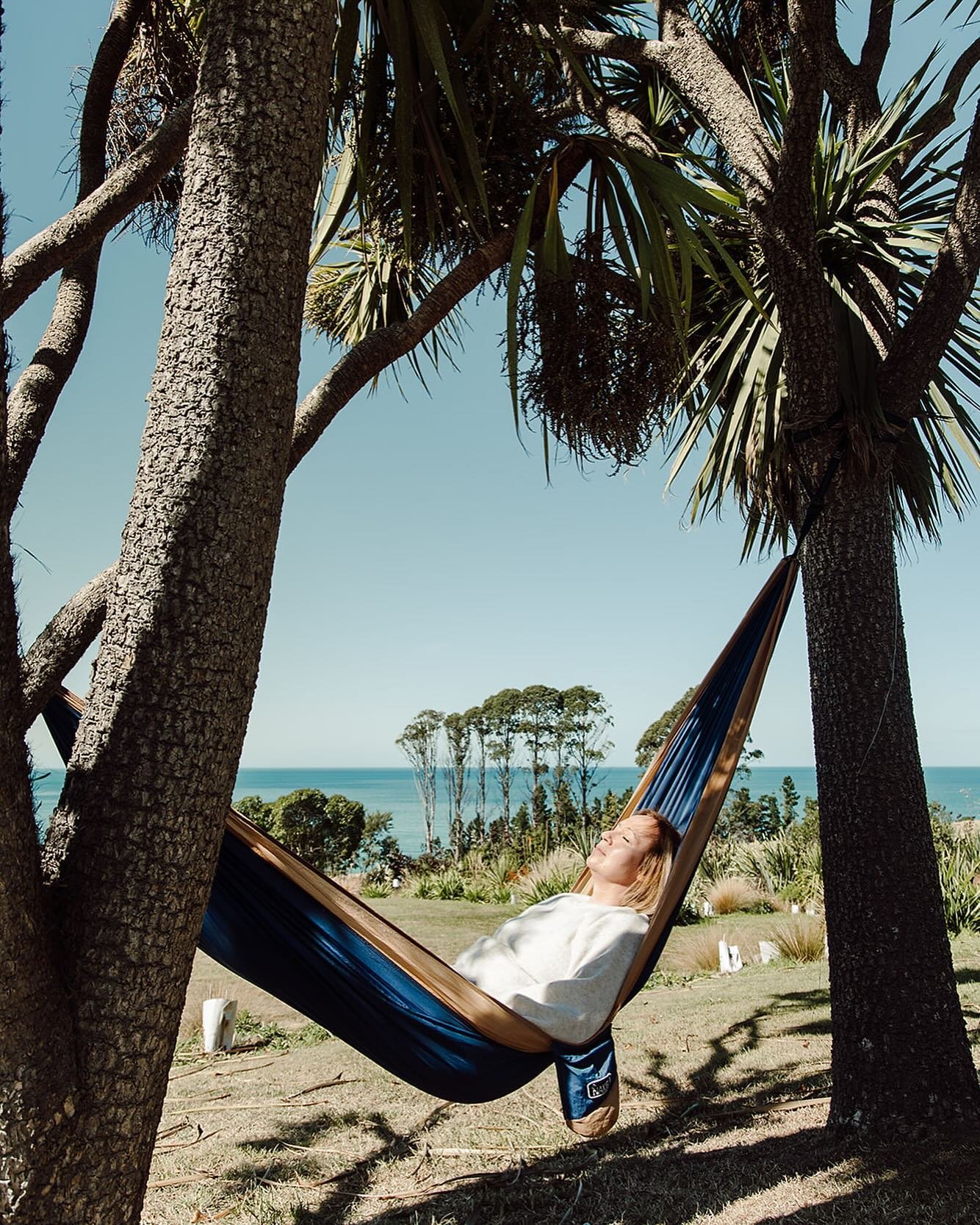Some days are just for finding quiet places in the sun and leaning into SLOW&hellip; Deep breaths ; the warmth of sun in your face ; the heady perfume of the cabbage trees ; the sounds of the waves crashing onto the beach; and a feeling of weightless