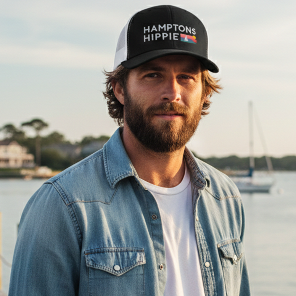 Hamptons Hippie HH-Logo Trucker Hat | Classic Mesh Snapback - modeled by man on beach