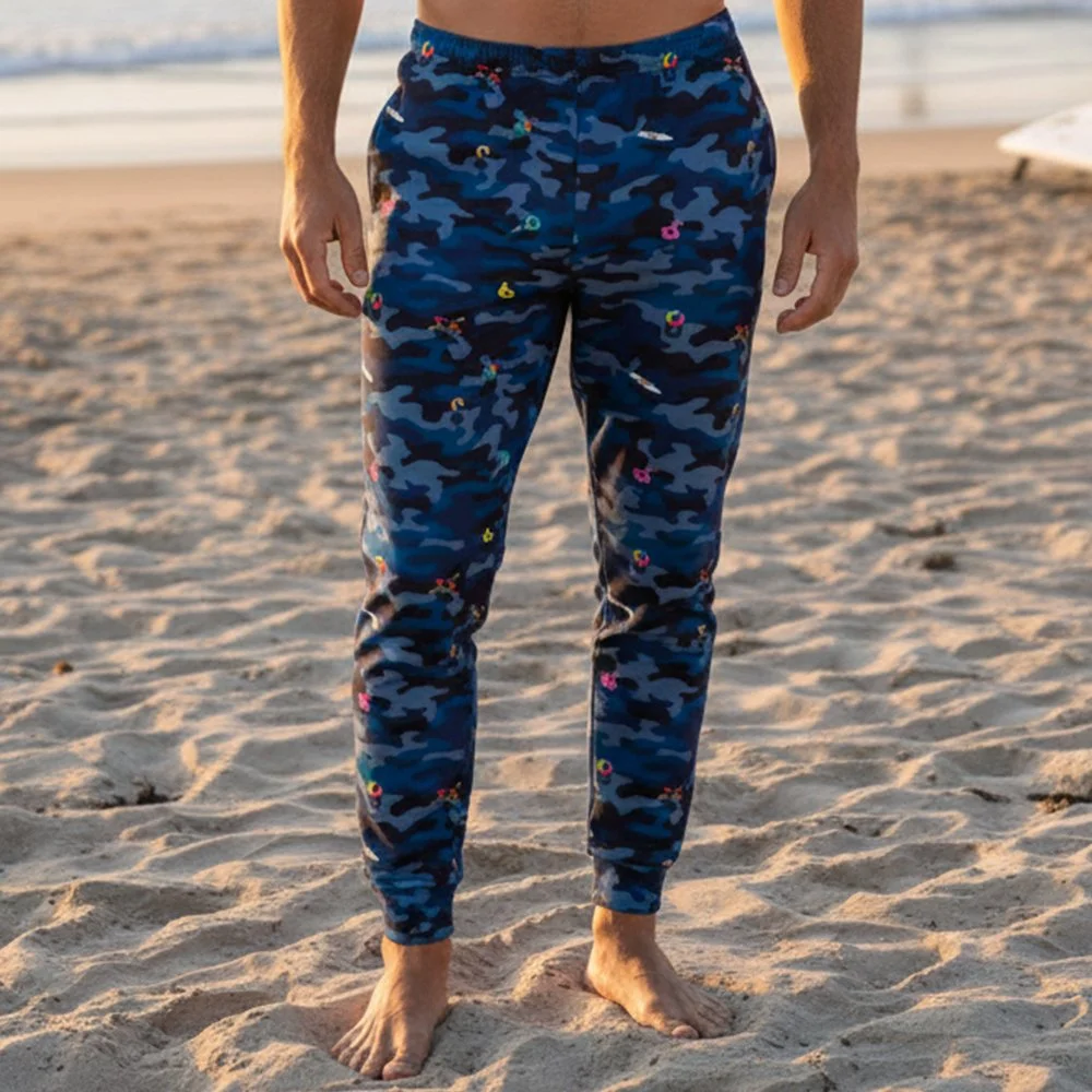 Man standing on sunny beach. HH Sea Camo Men’s Joggers