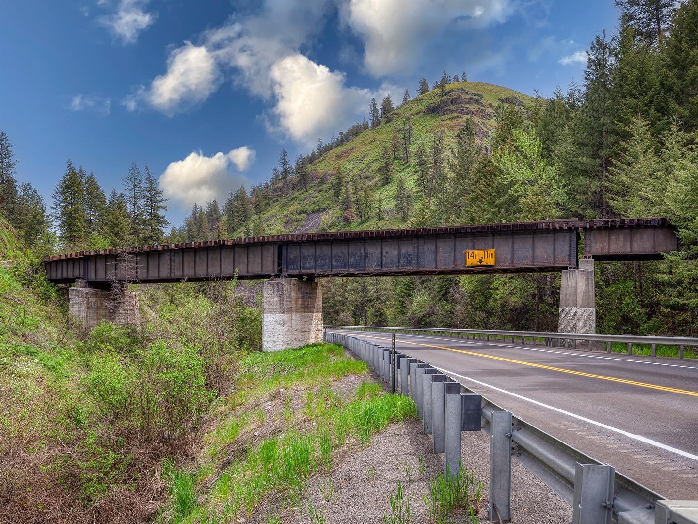 Potentially slated for removal, and seen as an eye sore by some, this small and not-so-pretty bridge has an amazing story and connects to so much more than what you can see from the road.  There are many tunnels and trestles at the other end of this 