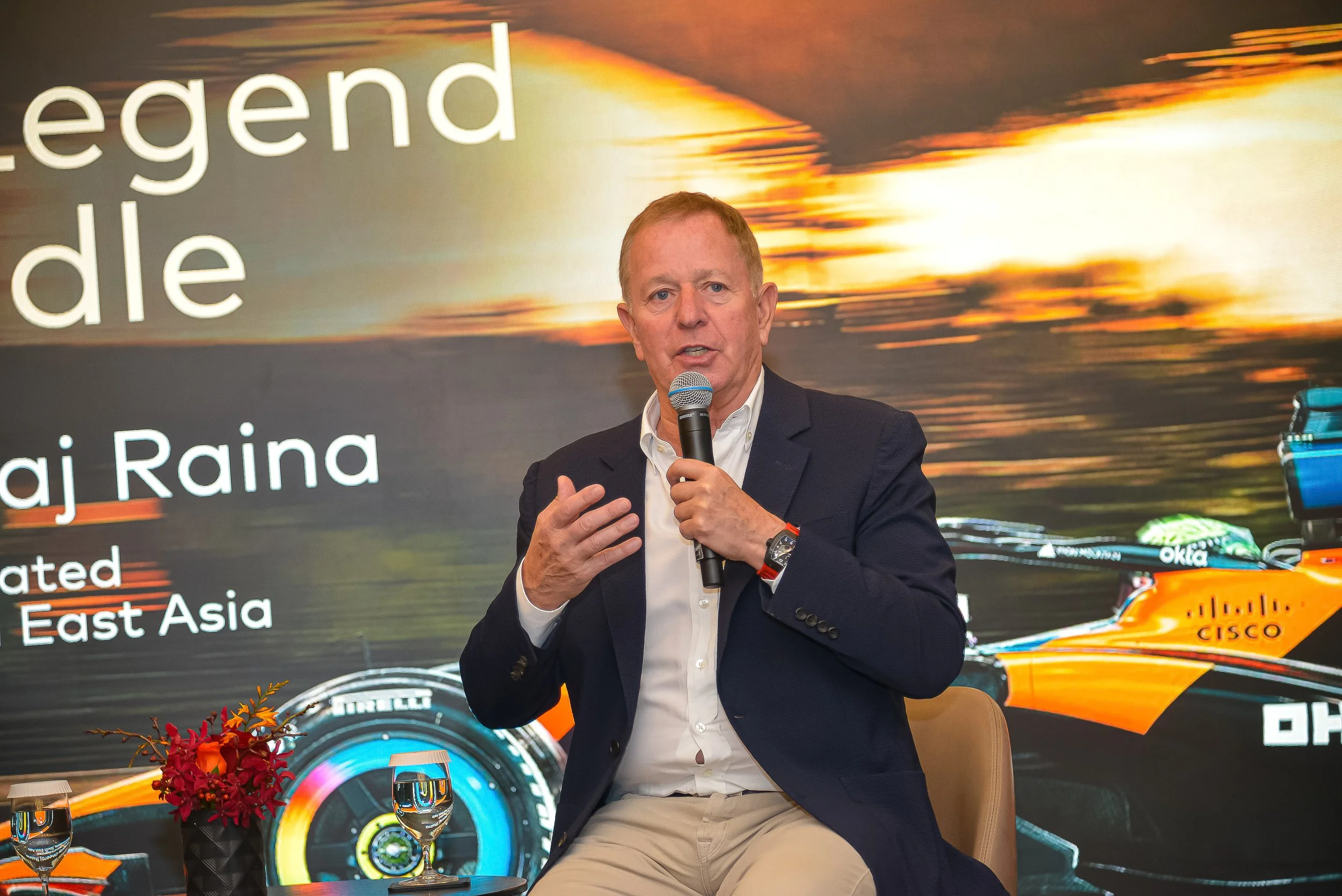 Photographing Martin Brundle at the McLaren Mastercard F1 Team Business Session in Kuala Lumpur