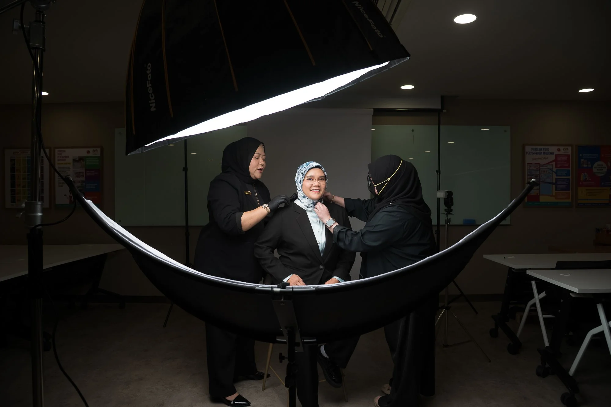 Faryn Razak - Corporate Make Up Artist helping behind the scene