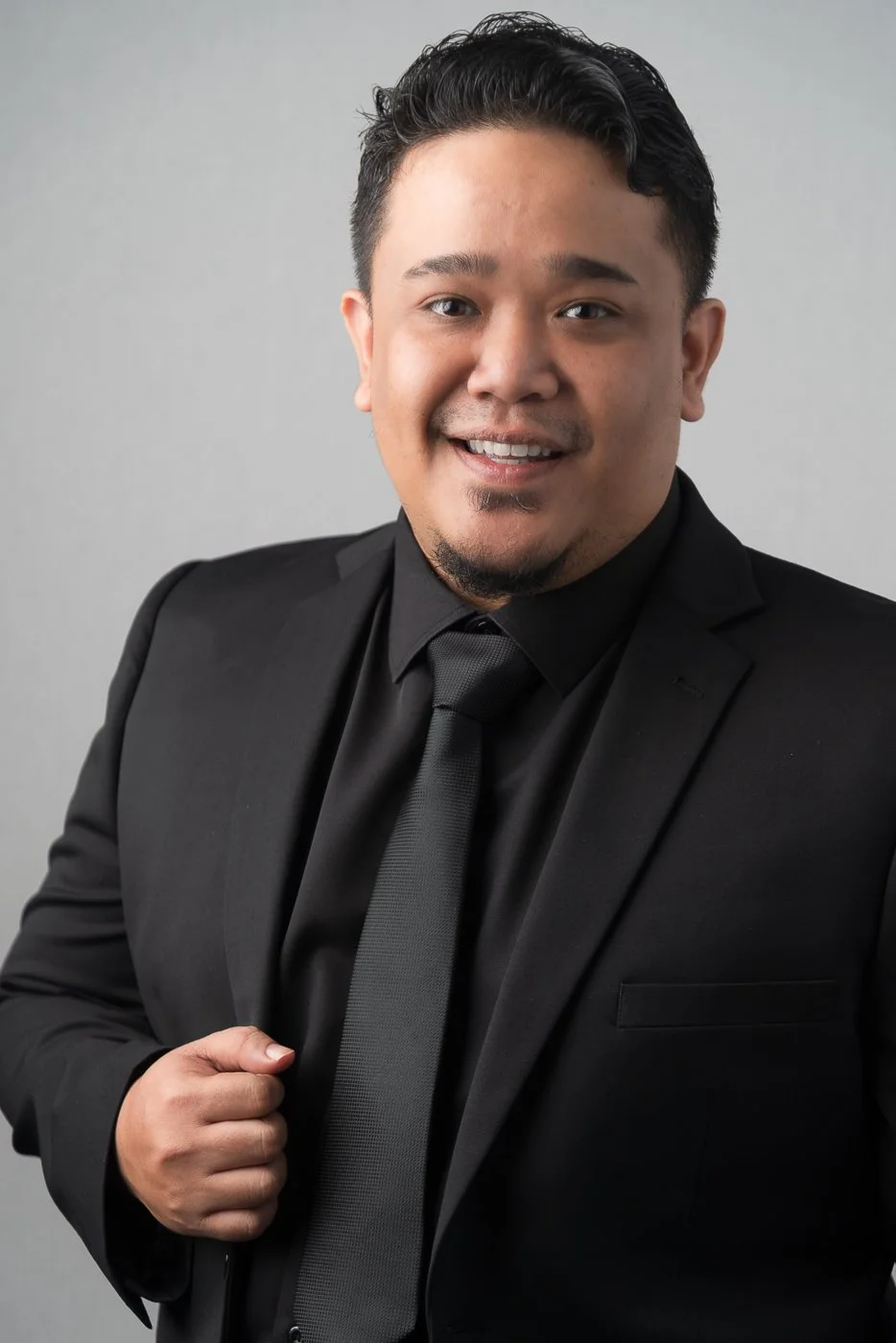 Professional business portraits of AurumLX team members for corporate branding.