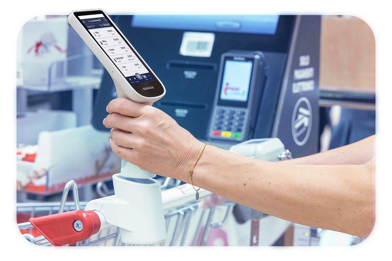 Shopper using scan&go device in store