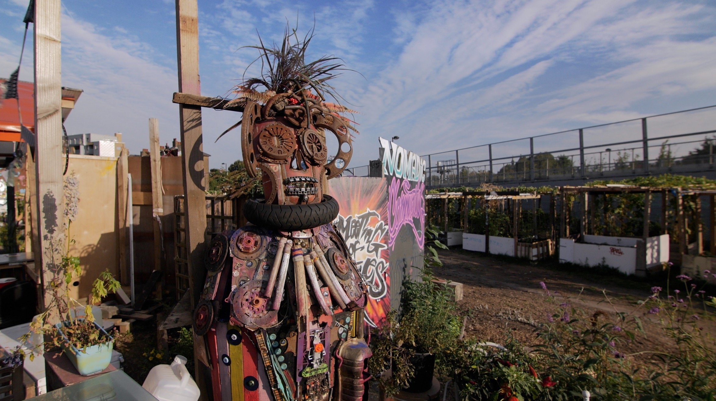 Nomadic Community Gardens documentary recycled sculpture vegetable beds.jpg