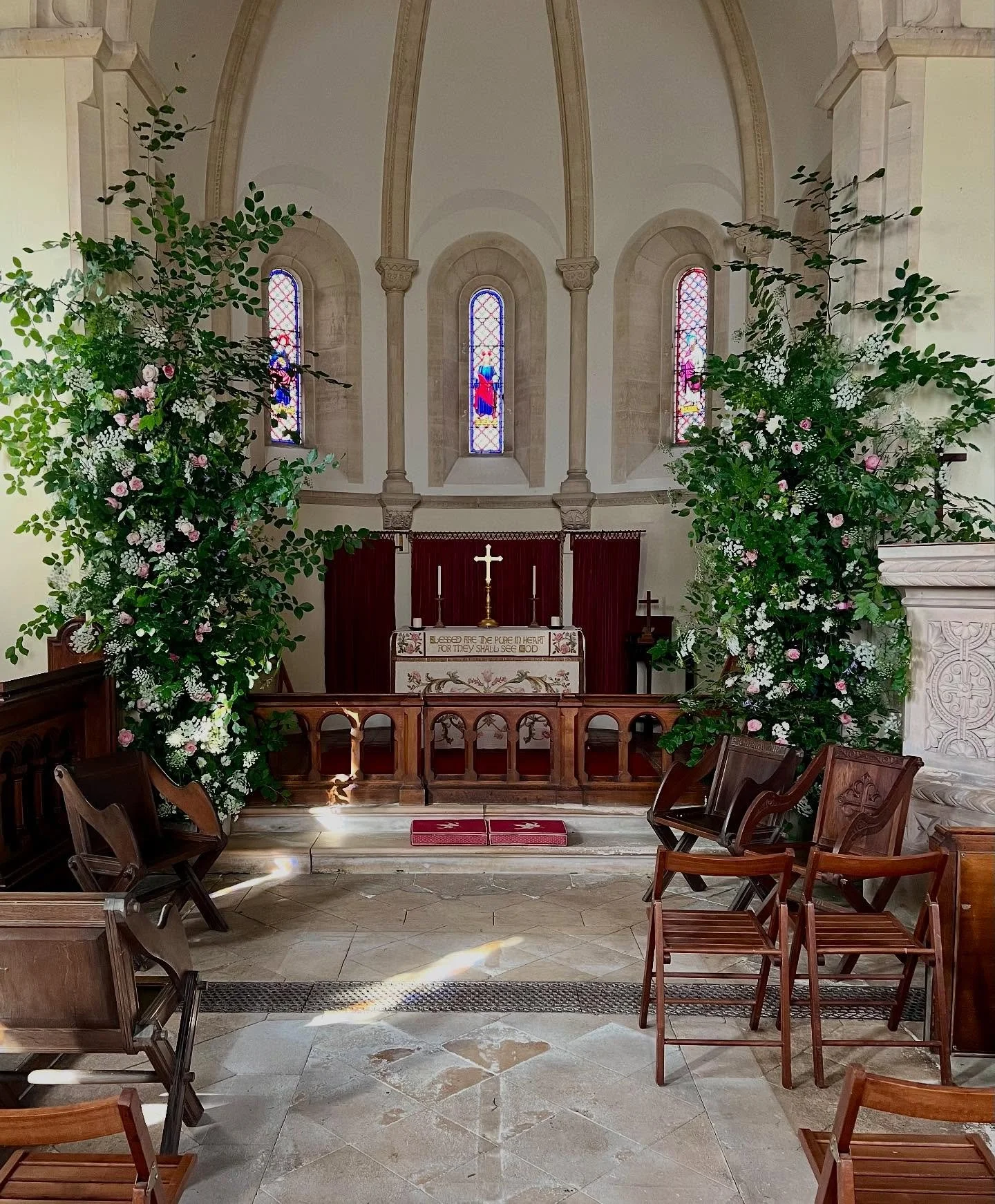 Flowers for a daughter’s wedding 💗💗💗!! Tall pillars framing the front of the church and a font full of sweet peas from our garden and @froglaneflowerfarm filling the church with a heavenly scent.  Scented roses from @therealflowerco 
As alw