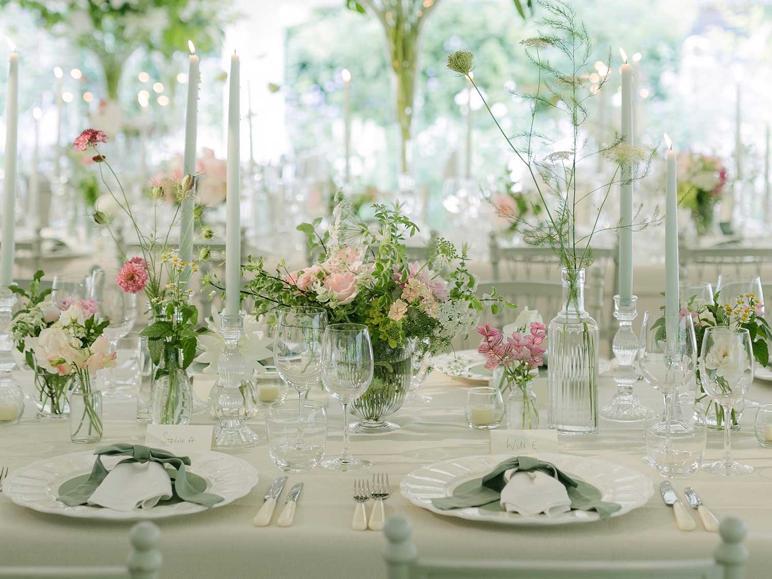 Wedding flowers inside a marquee at a wedding near Stroud