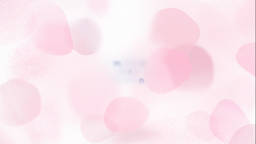Blurred pink heart-shaped and round objects with a faint white background.