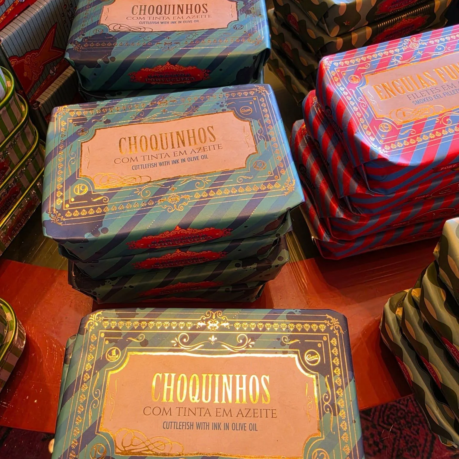 I was supposed to be fully off. 🌴

Thirty-two days. No briefs, no production timelines, no press checks quietly running in the background of my brain.

And then I saw these sardine packages and gift sets and just&hellip; stood there. Studying the la
