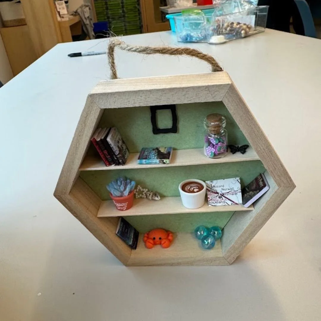 Photos from May's craft "mini shelves" - so much fun!
Join us in June to make a diamond art magnet. Sign up at 9am on June 1st!