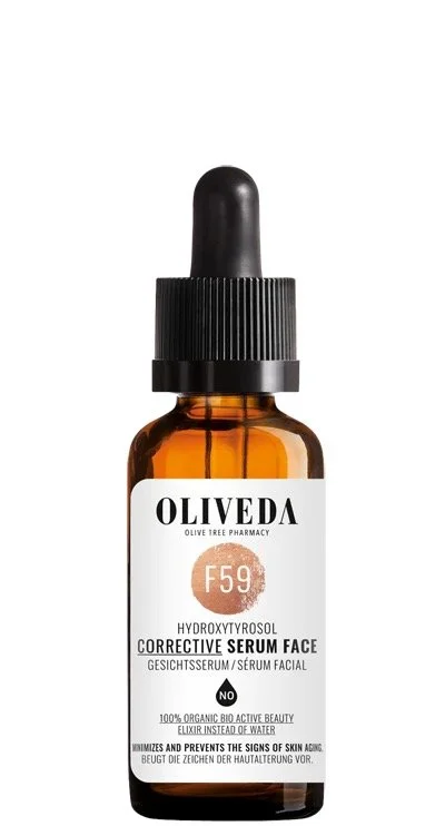 Bottle of Oliveda hydroxytyrosol corrective serum for the face with a black dropper cap and white label, containing text and branding details.