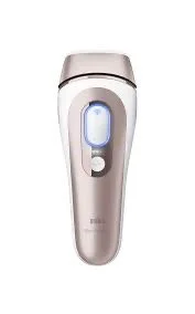 A close-up of a facial razor with a white and rose gold handle, featuring a lighted display and control buttons.