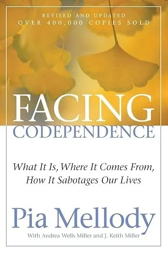 Book cover titled "Facing Codependence" by Pia Melody, featuring yellow flower petals in the background.