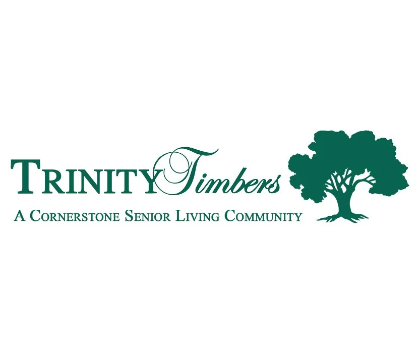 Logo for Trinity Timbers, a cornerstone senior living community, featuring text and a silhouette of a large tree.