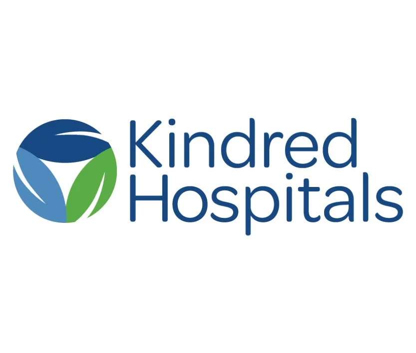 Logo of Kindred Hospitals with a circular graphic in dark blue, light blue, and green, and the text 'Kindred Hospitals' in blue.