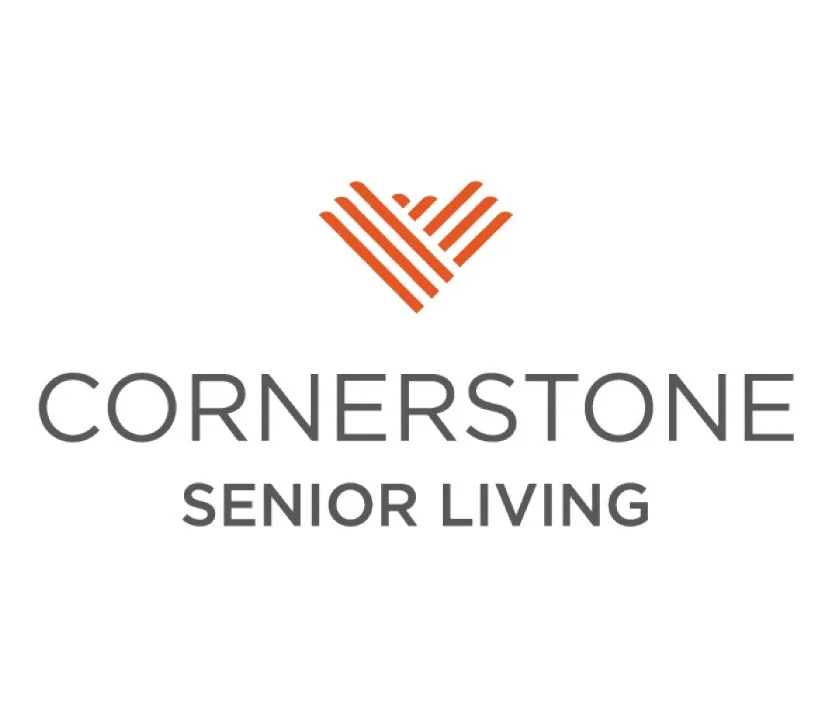 Logo for Cornerstone Senior Living with a stylized red heart above the text.
