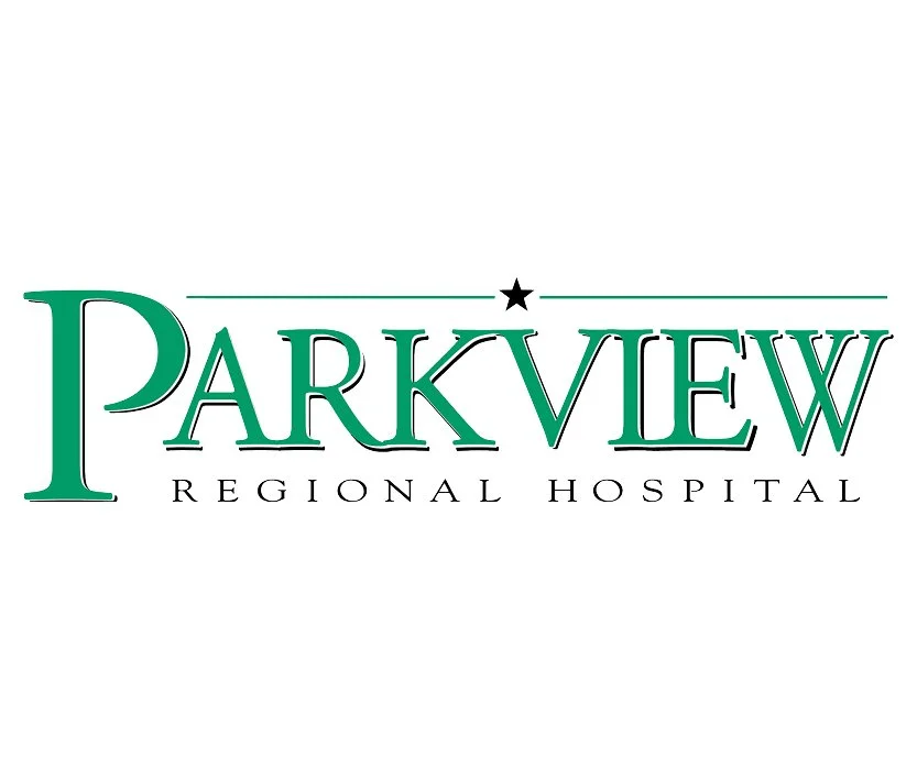 Logo for Parkview Regional Hospital with the name in green and black text, a black star above the 'I' in 'Parkview', and a line extending from both sides of the star.