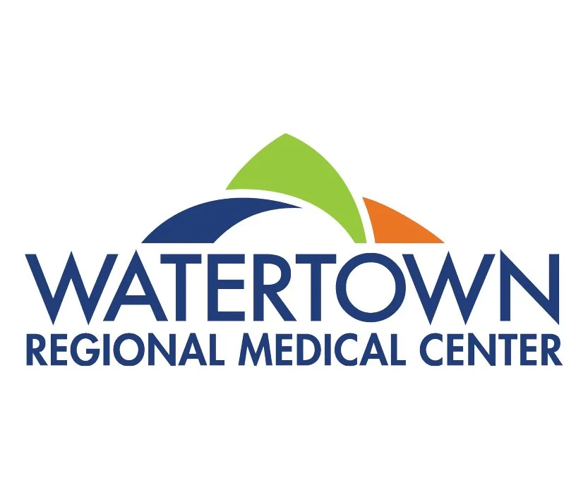 Logo for Watertown Regional Medical Center with a stylized mountain design in green, blue, and orange.