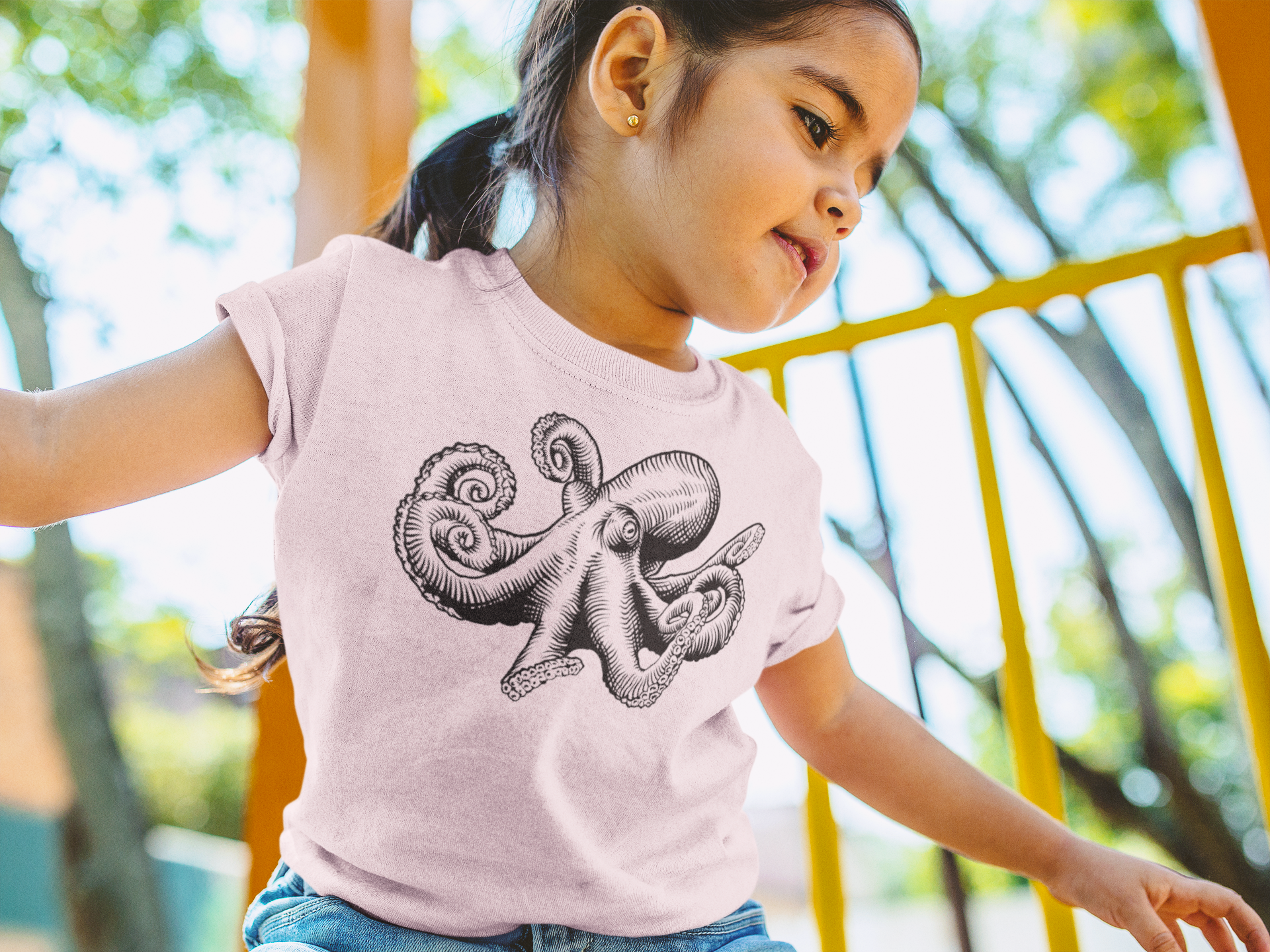 little-girl-playing-at-the-jungle-gym-t-shirt-mockup-a12107.png