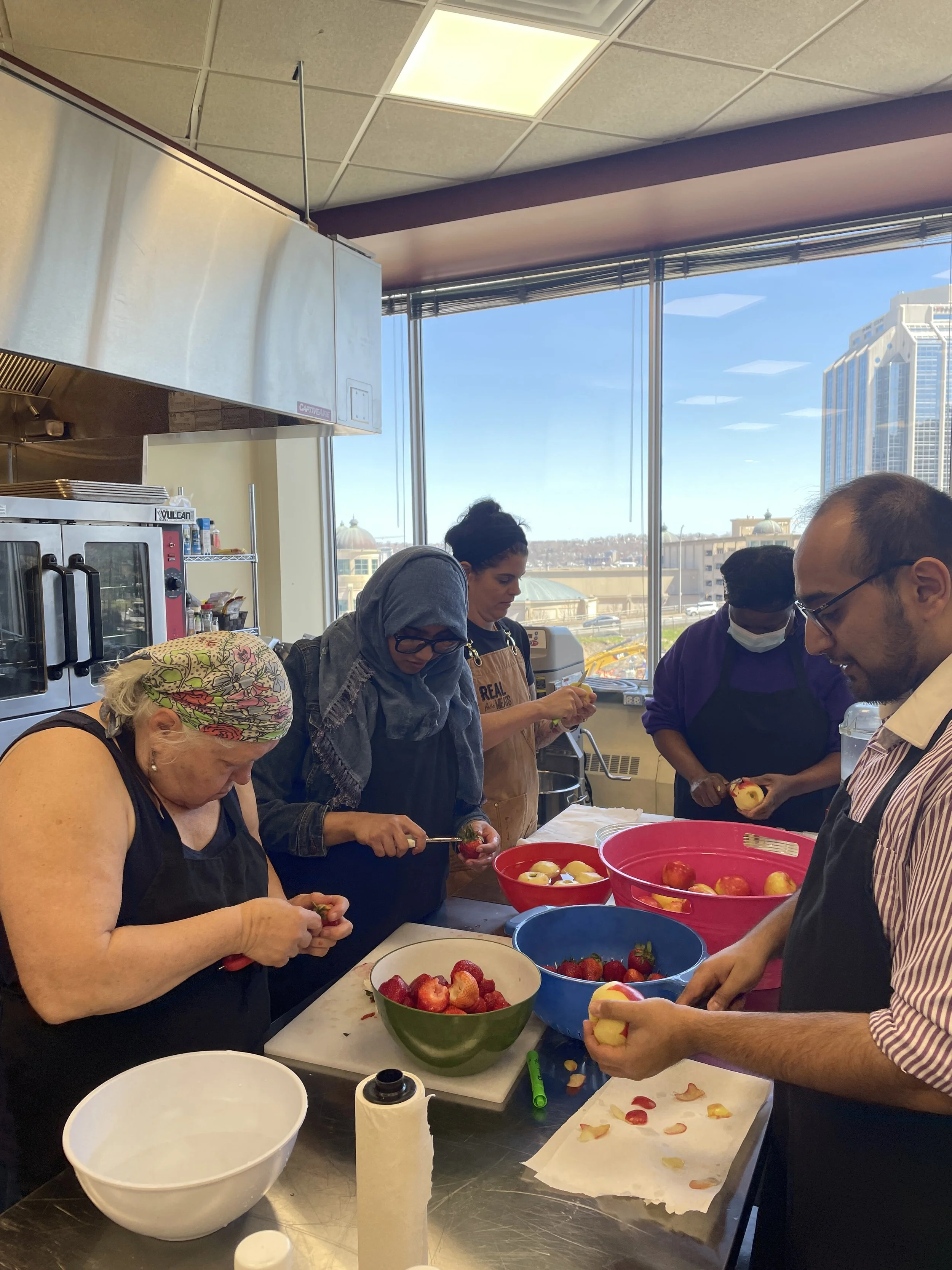 Neighbours learn to make jam at the Mi'kmaw Native Friendship Centre as part of Pantry Collaborative Business Program, Spring 2023
