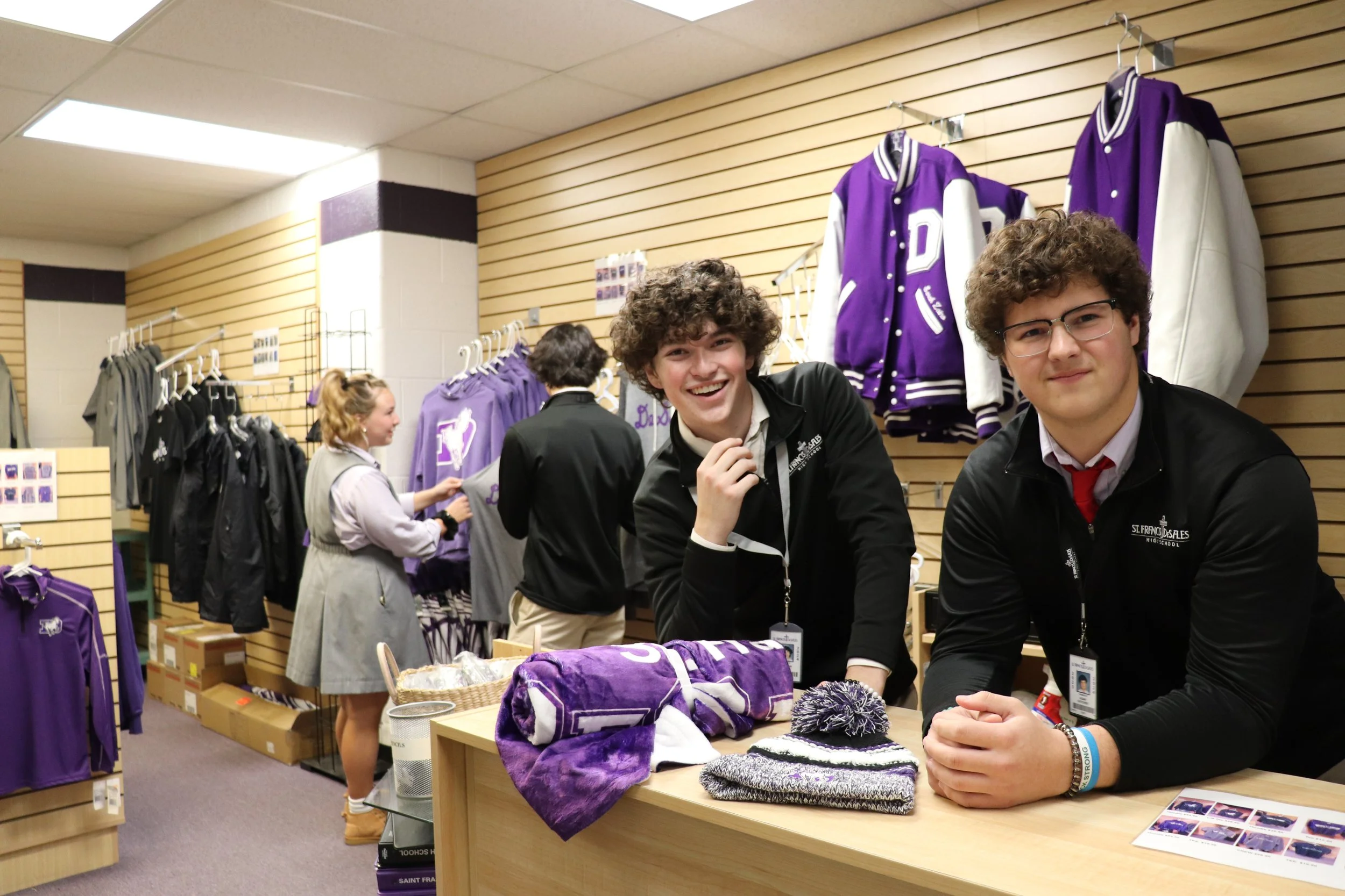 Students collaborating in a business class at St. Francis DeSales High School