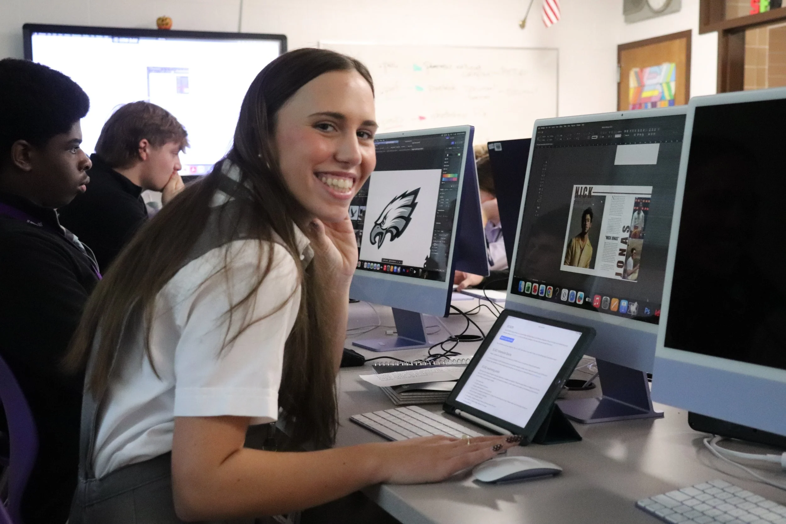 Students collaborating in a english class at St. Francis DeSales High School