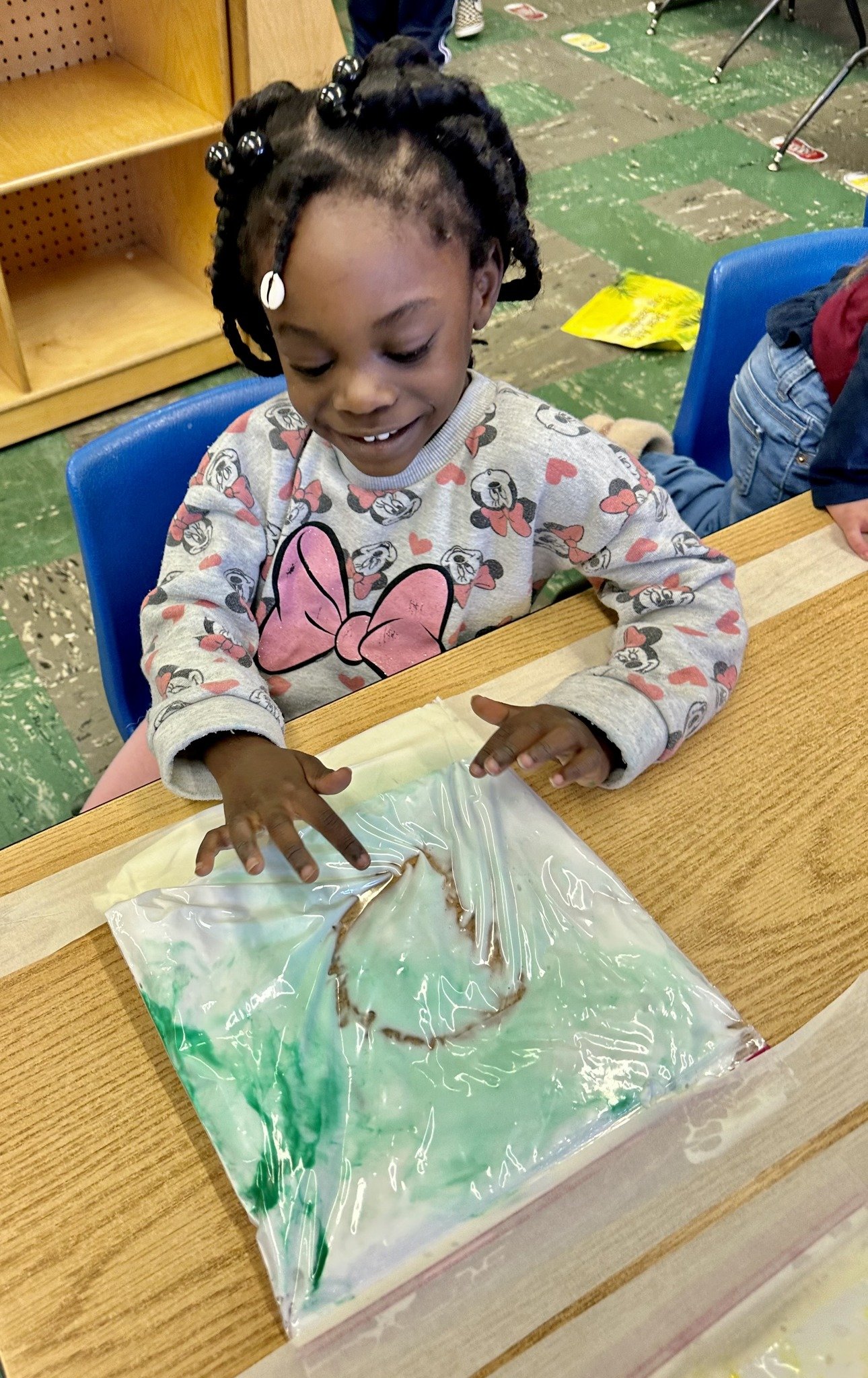  Wilson Head Start classroom #3  Ms. Reyes said, "I made sensory bags for the little ones today. A little shaving cream and washable paint and we had a fun filled letter recognition activity 