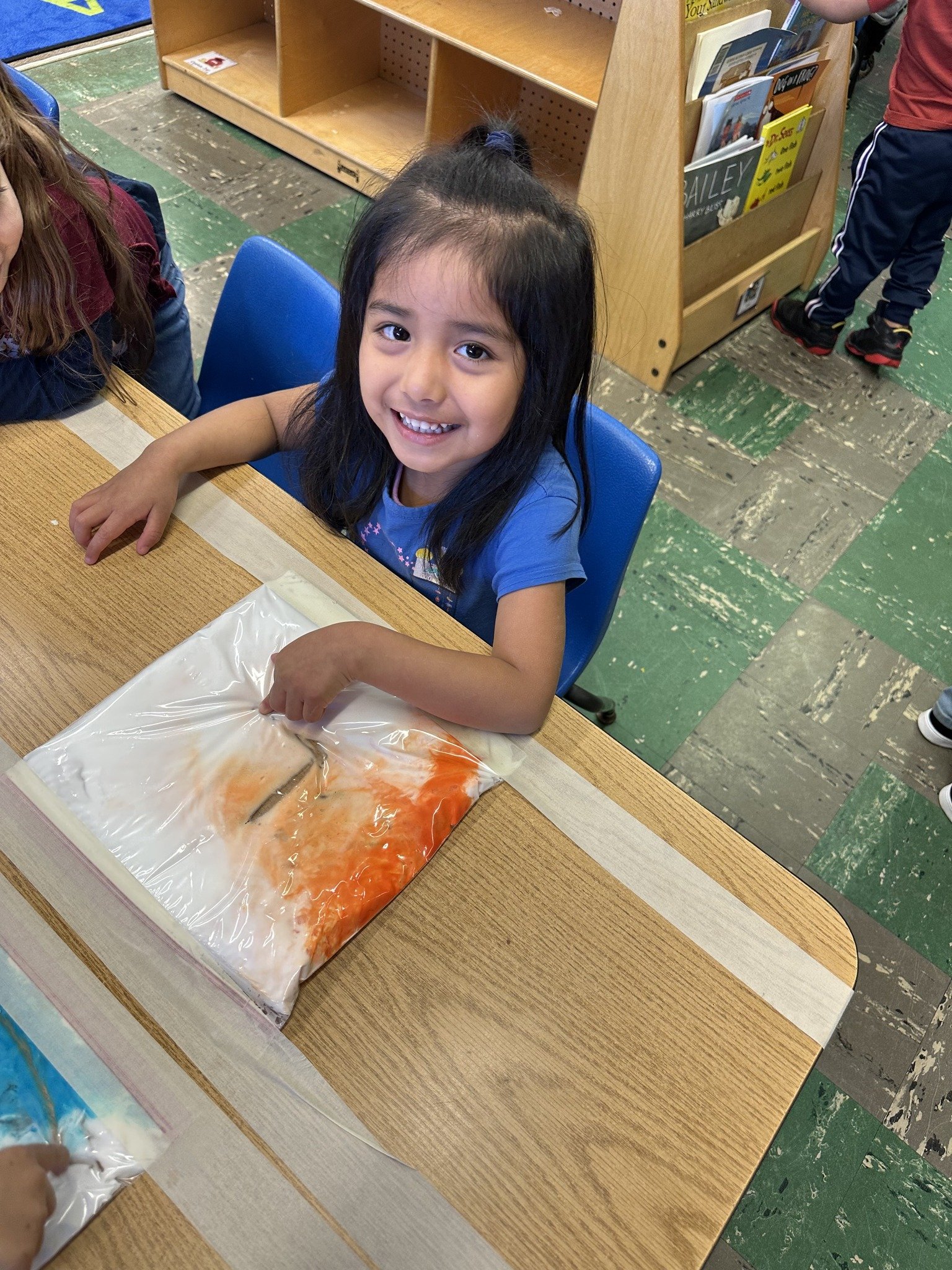  Wilson Head Start classroom #3  Ms. Reyes said, "I made sensory bags for the little ones today. A little shaving cream and washable paint and we had a fun filled letter recognition activity 