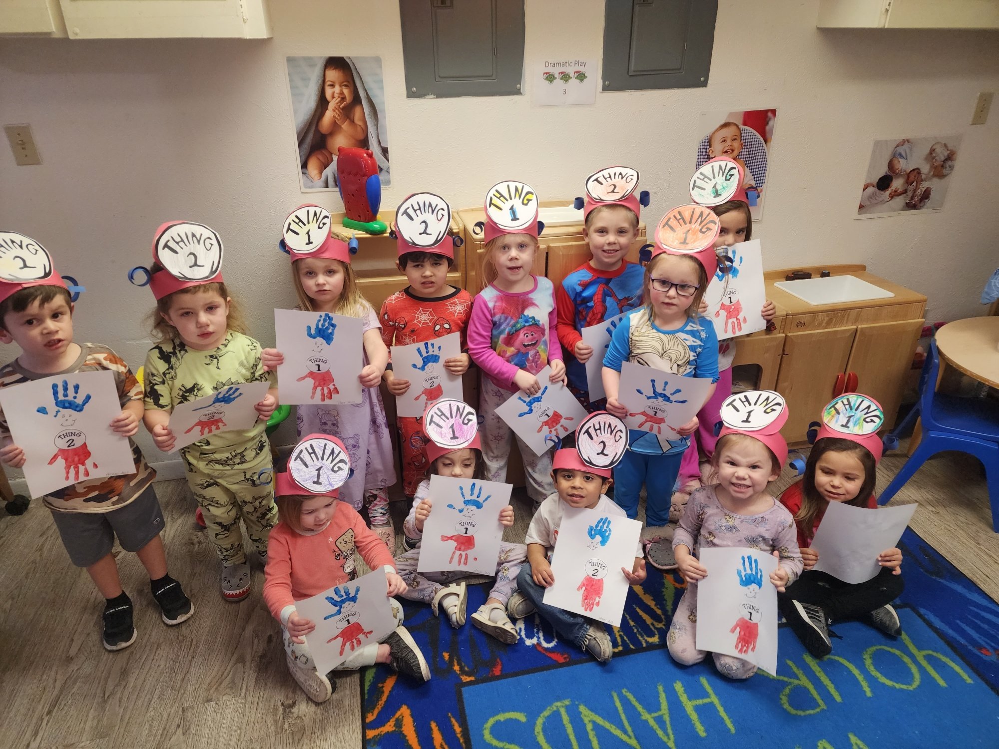  Ms. Beeson reported, "Mangum 3 year olds celebrated Dr. Seuss week and Thursday was One fish, two fish, red fish blue fish wear red and blue and Friday was wear favorite pj's. We also painted hand prints of Thing 1 and Thing 2." 